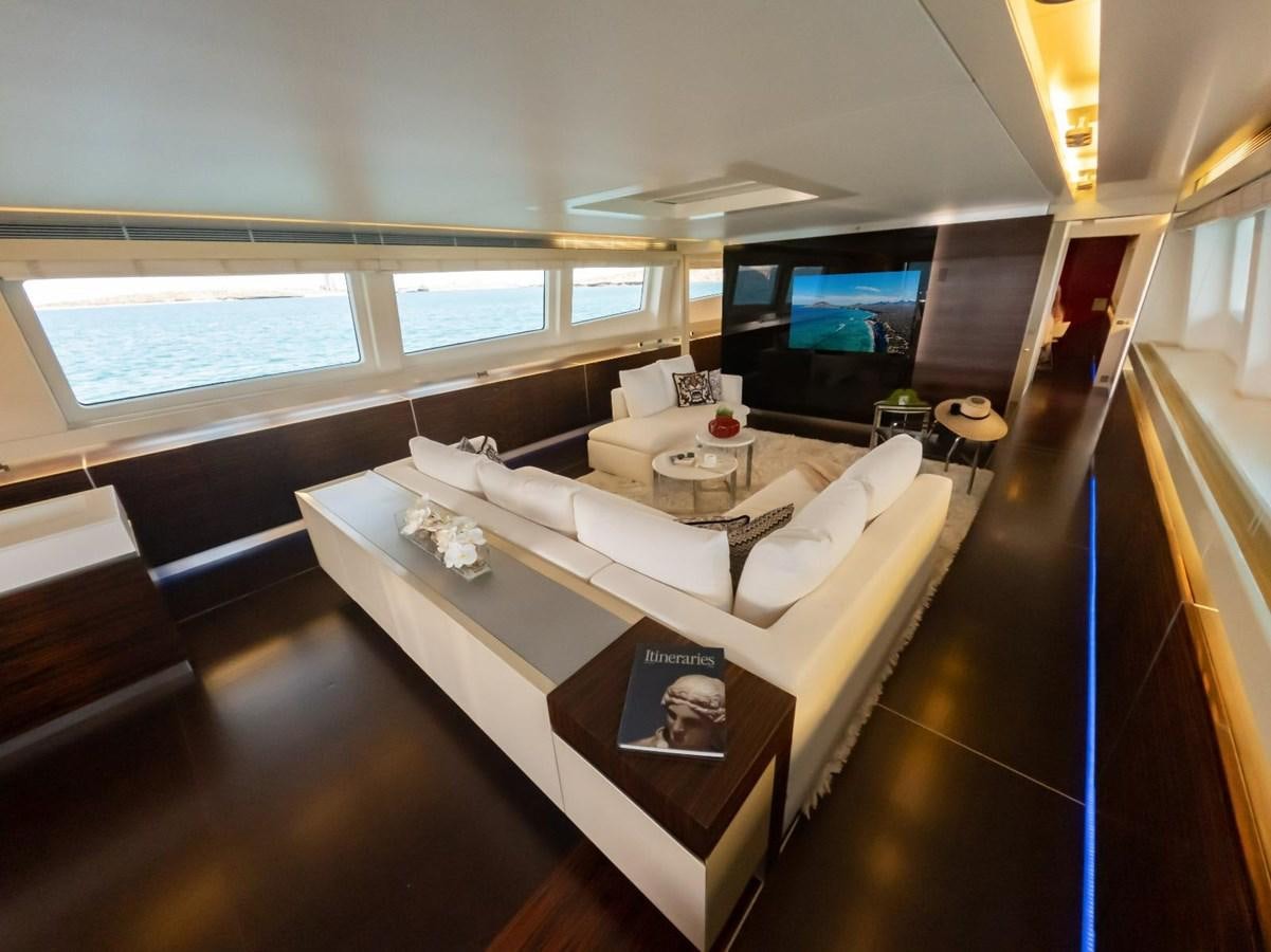 a room with a bed and a television aboard CANADOS FLYBRIDGE FAST Yacht for Sale