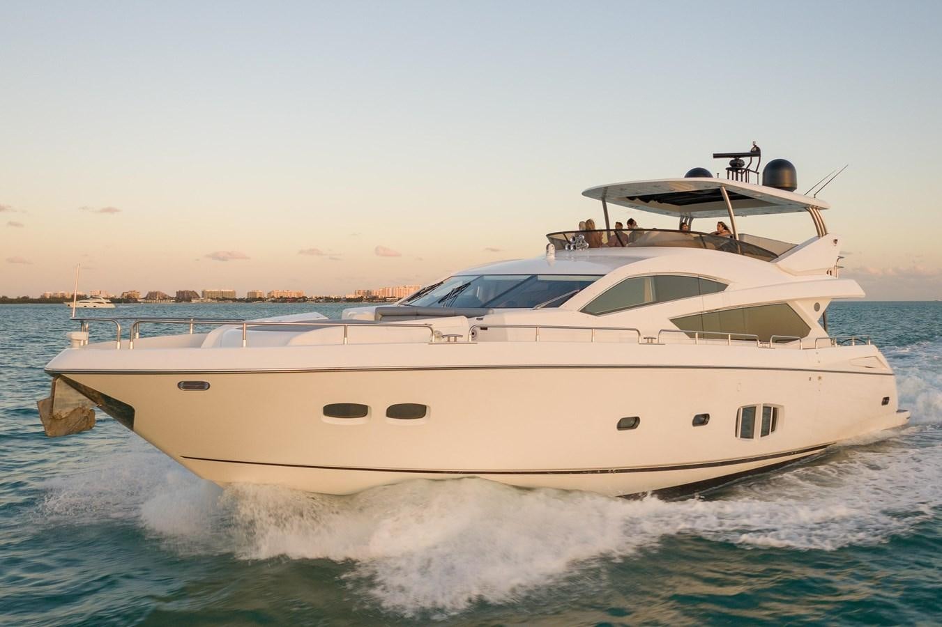 a white yacht on the water aboard SUNSEEKER 88  Yacht for Sale