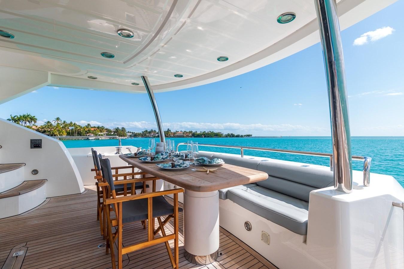 a table and chairs on a deck aboard SUNSEEKER 88  Yacht for Sale