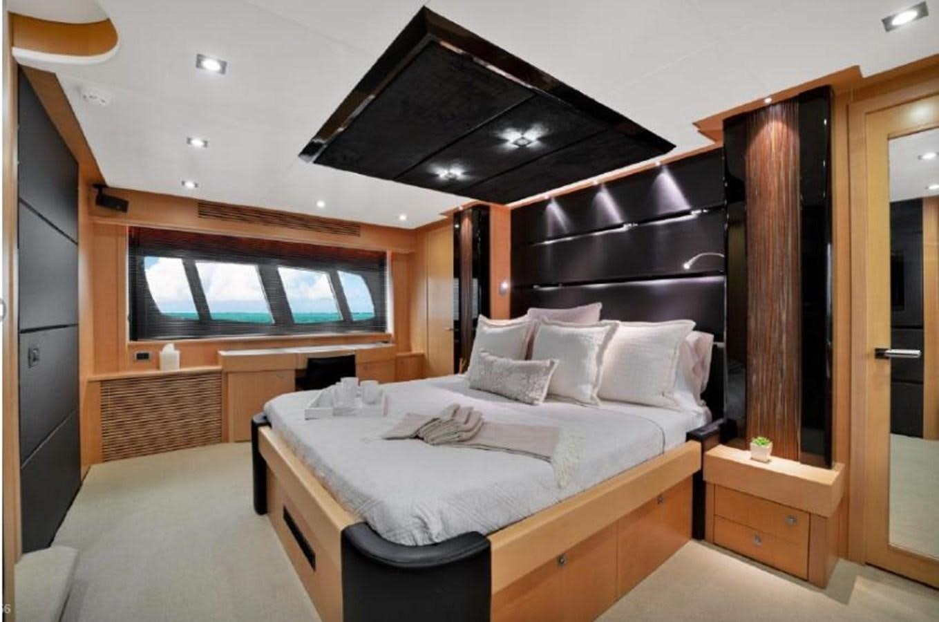a bed in a room aboard SUNSEEKER 88  Yacht for Sale