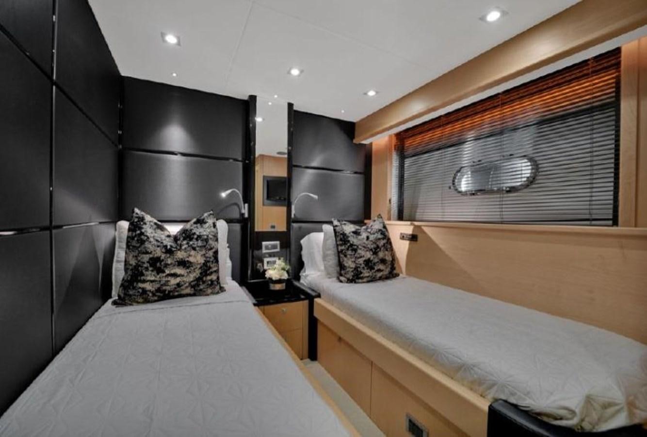 a room with two beds aboard SUNSEEKER 88  Yacht for Sale