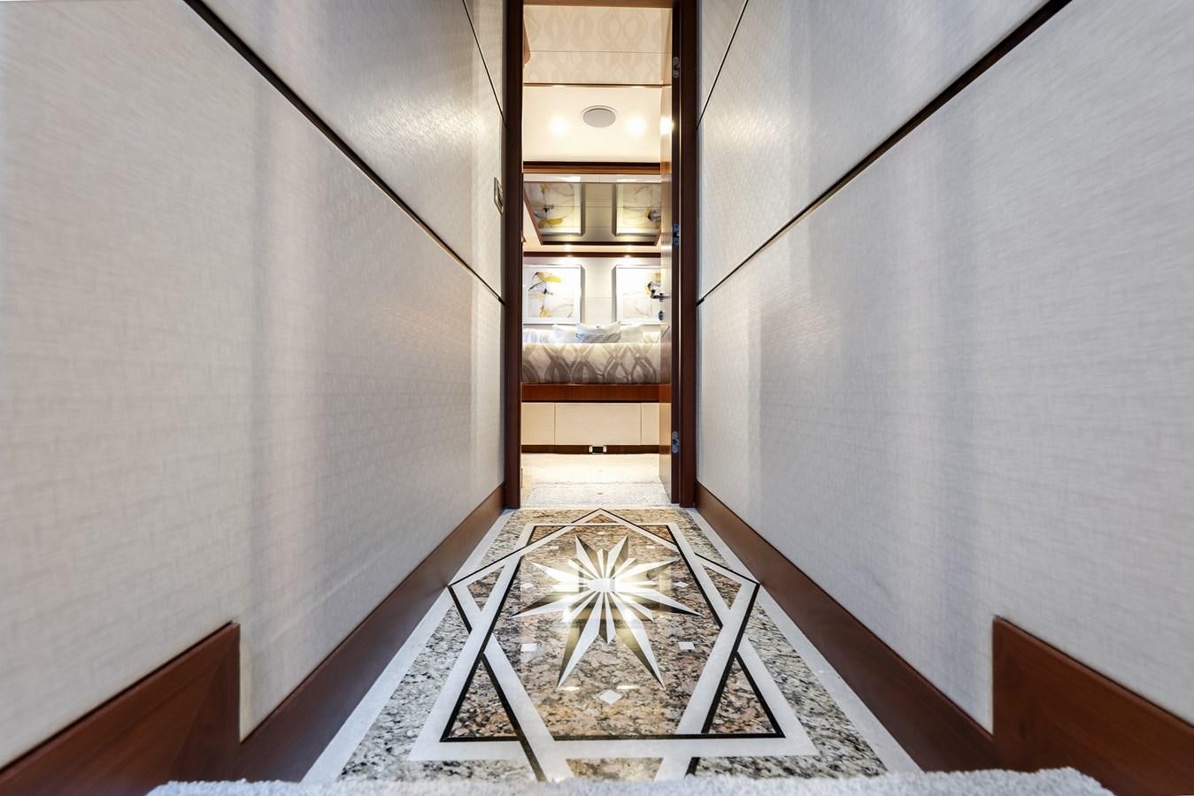 a hallway with a glass door aboard UNCORKED Yacht for Sale