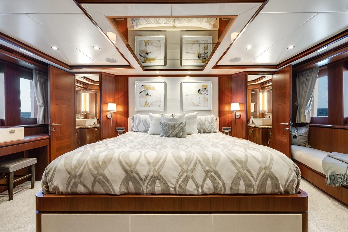 a large bed in a room aboard UNCORKED Yacht for Sale