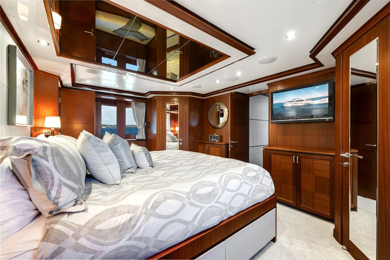 a bed in a room aboard UNCORKED Yacht for Sale