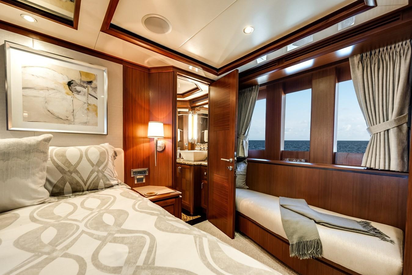 a room with two beds aboard UNCORKED Yacht for Sale