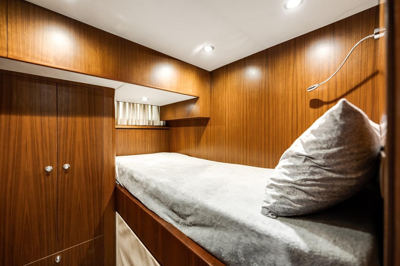 a bed in a room aboard UNCORKED Yacht for Sale
