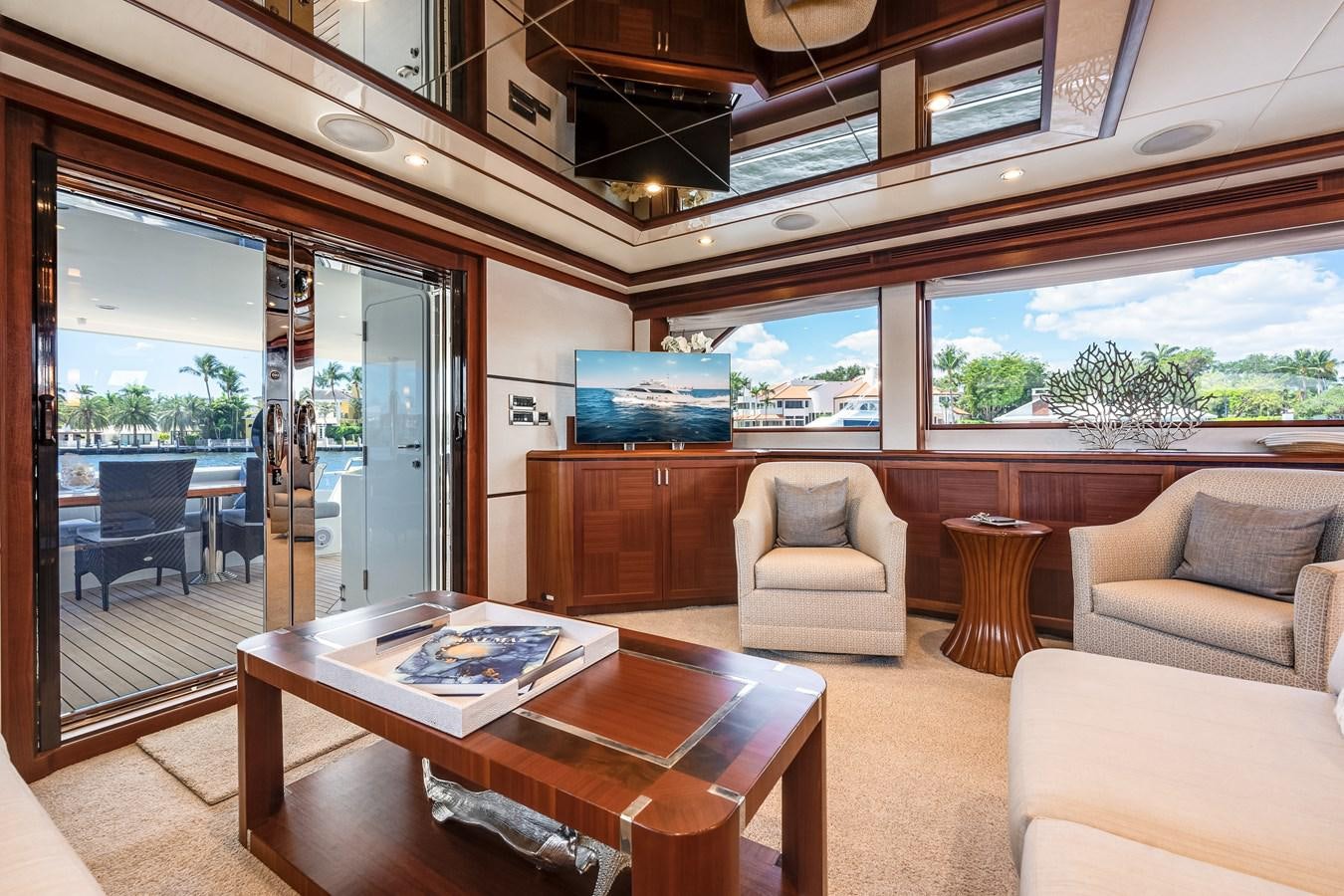 a living room with a large window aboard UNCORKED Yacht for Sale
