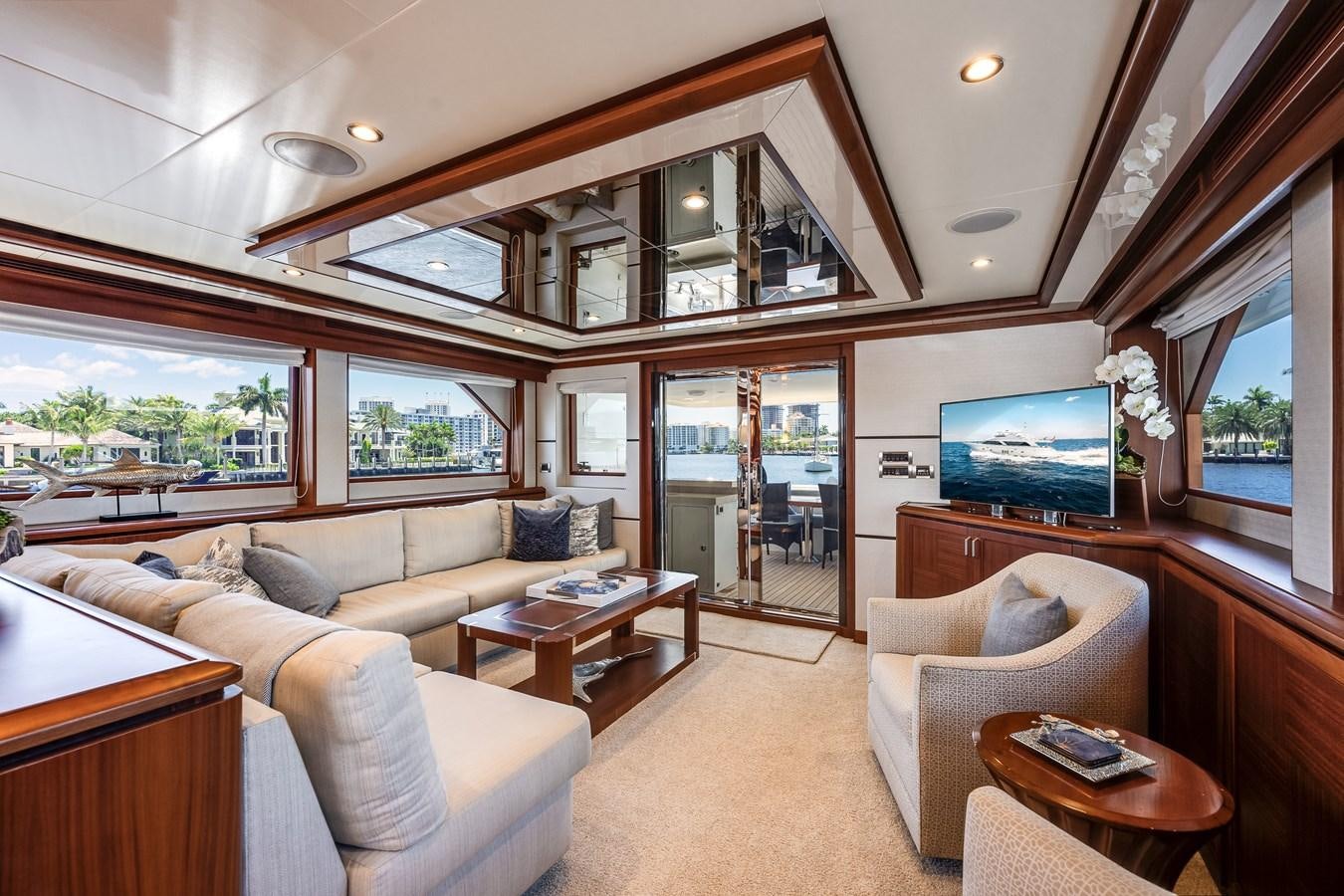 a living room with a large window aboard UNCORKED Yacht for Sale