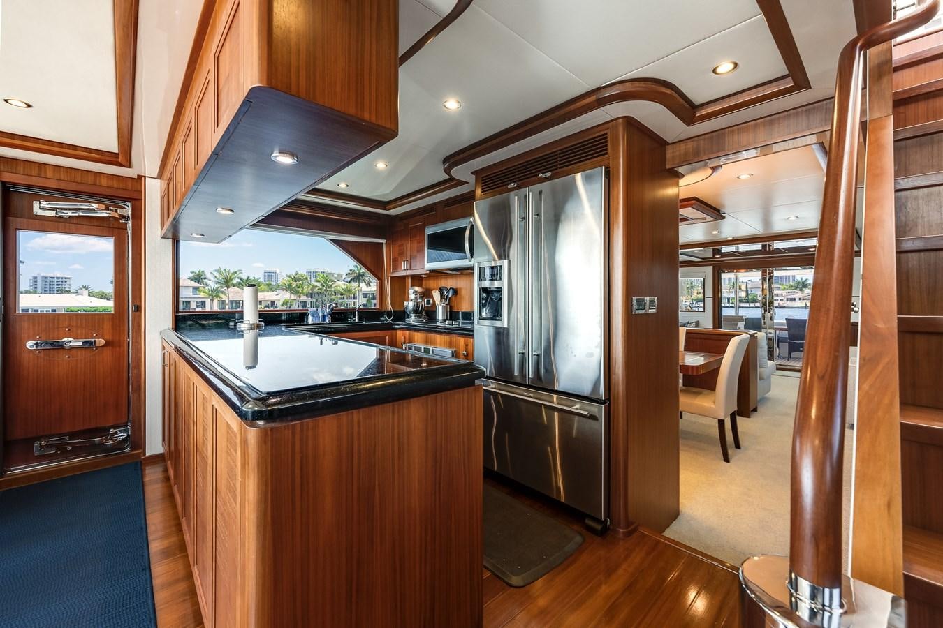 a kitchen with a large island aboard UNCORKED Yacht for Sale