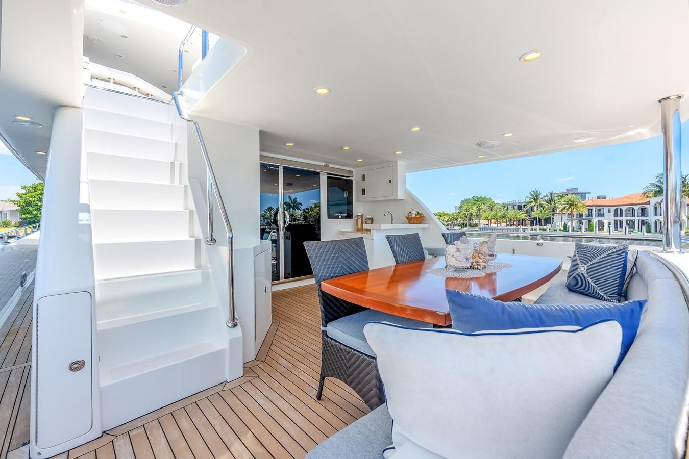 a living room with a balcony aboard UNCORKED Yacht for Sale