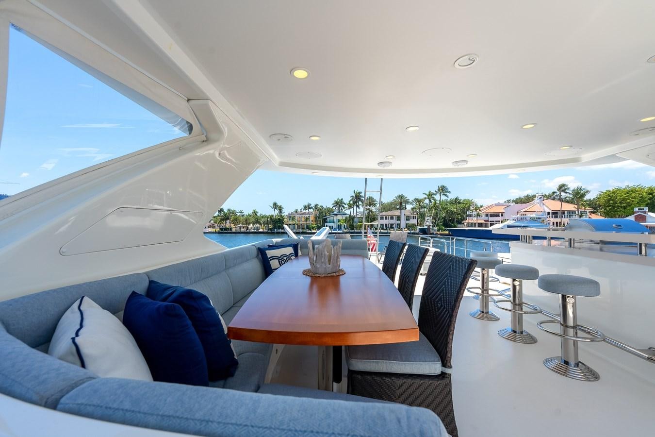 a room with a table and chairs aboard UNCORKED Yacht for Sale