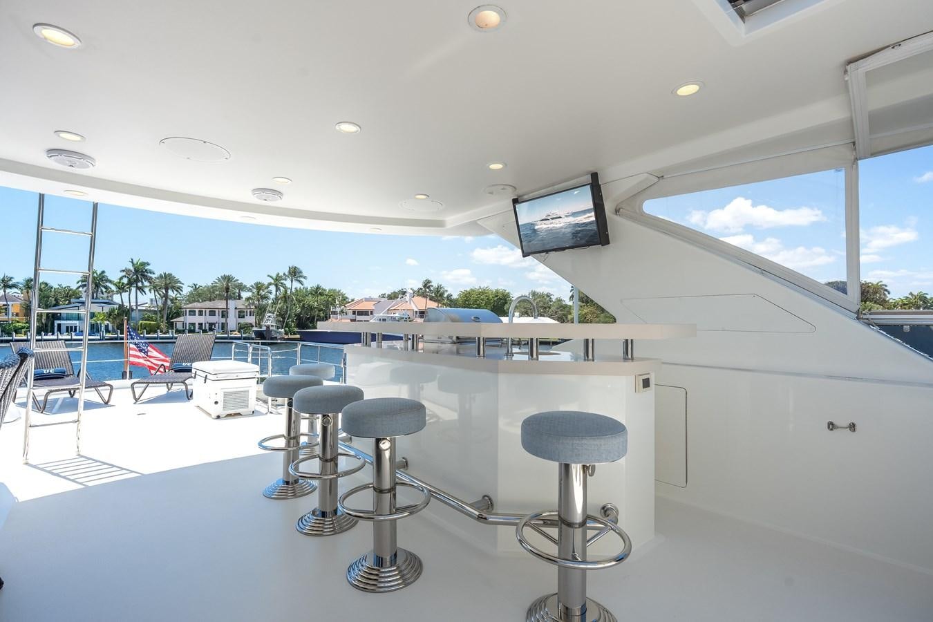 a room with a table and chairs aboard UNCORKED Yacht for Sale
