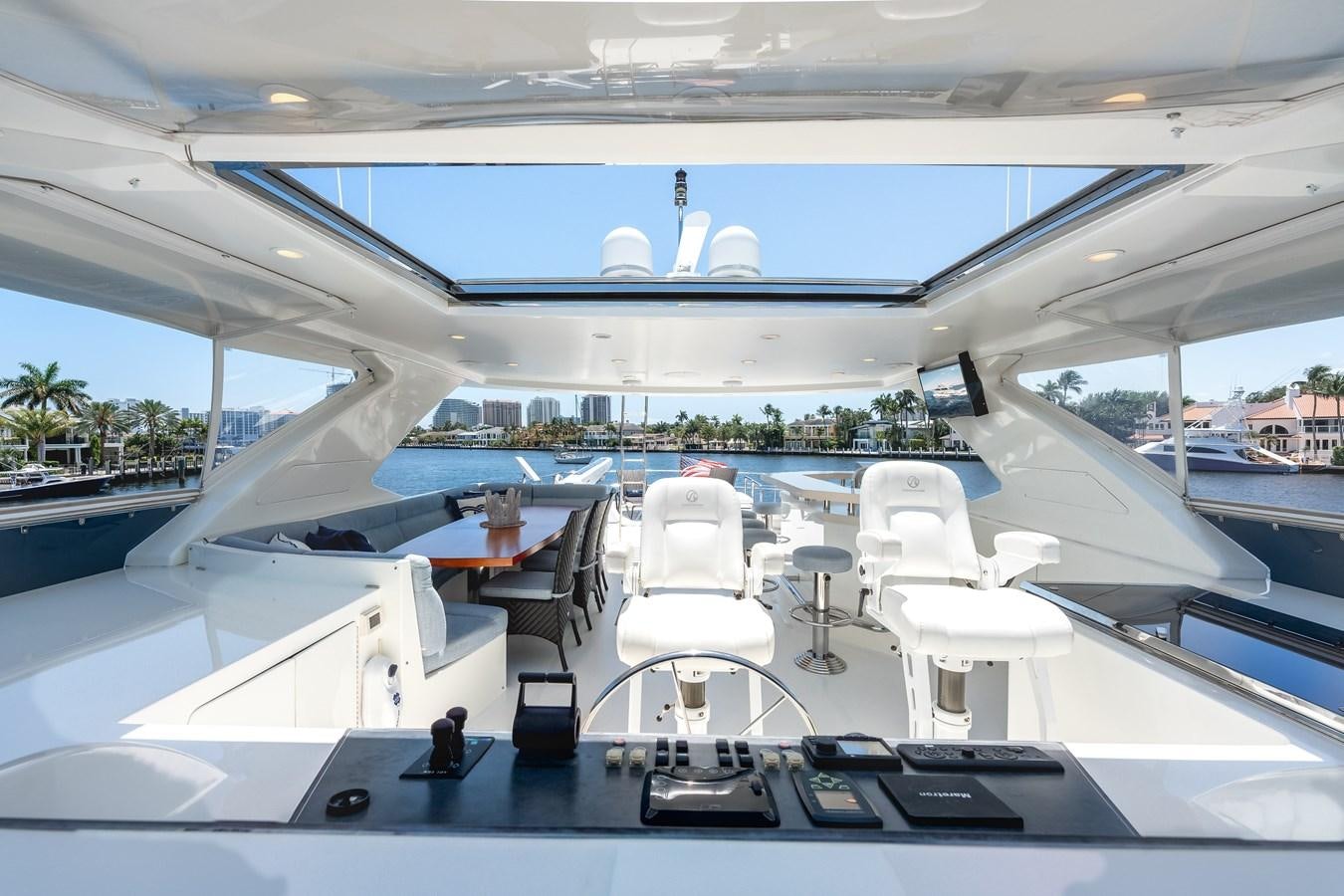 a large room with a large pool aboard UNCORKED Yacht for Sale