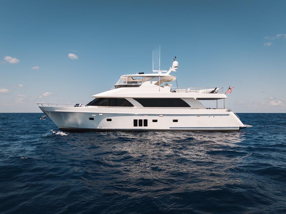 a white yacht in the water aboard UNCORKED Yacht for Sale