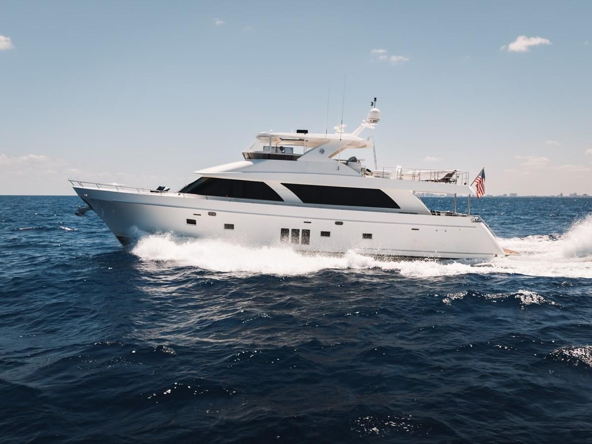 a white yacht in the water aboard UNCORKED Yacht for Sale