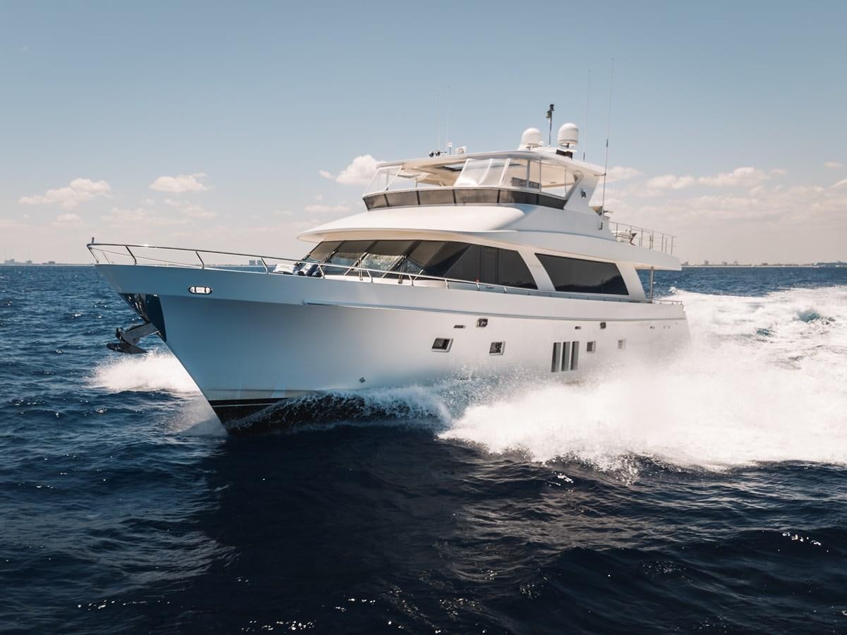 a white yacht on the water aboard UNCORKED Yacht for Sale