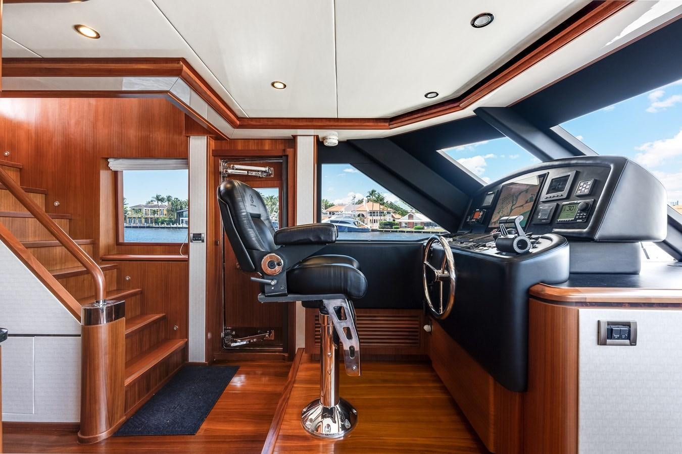 a black office chair in a room aboard UNCORKED Yacht for Sale