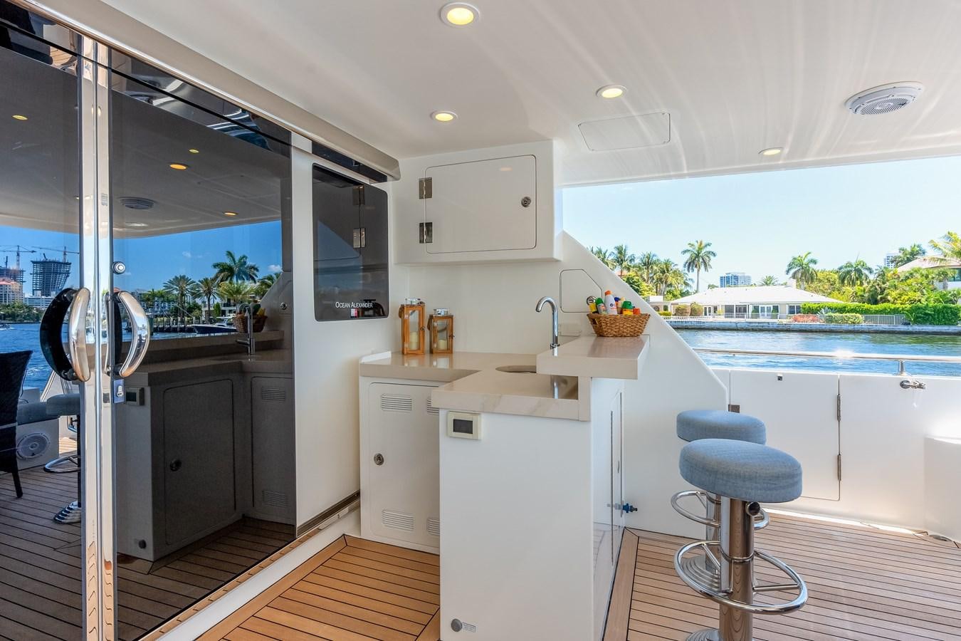 a kitchen with a glass door aboard UNCORKED Yacht for Sale