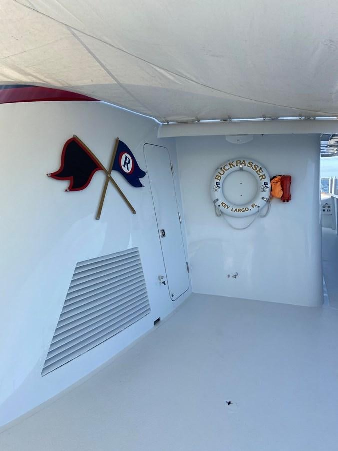 a clock on a wall aboard BUCKPASSER Yacht for Sale
