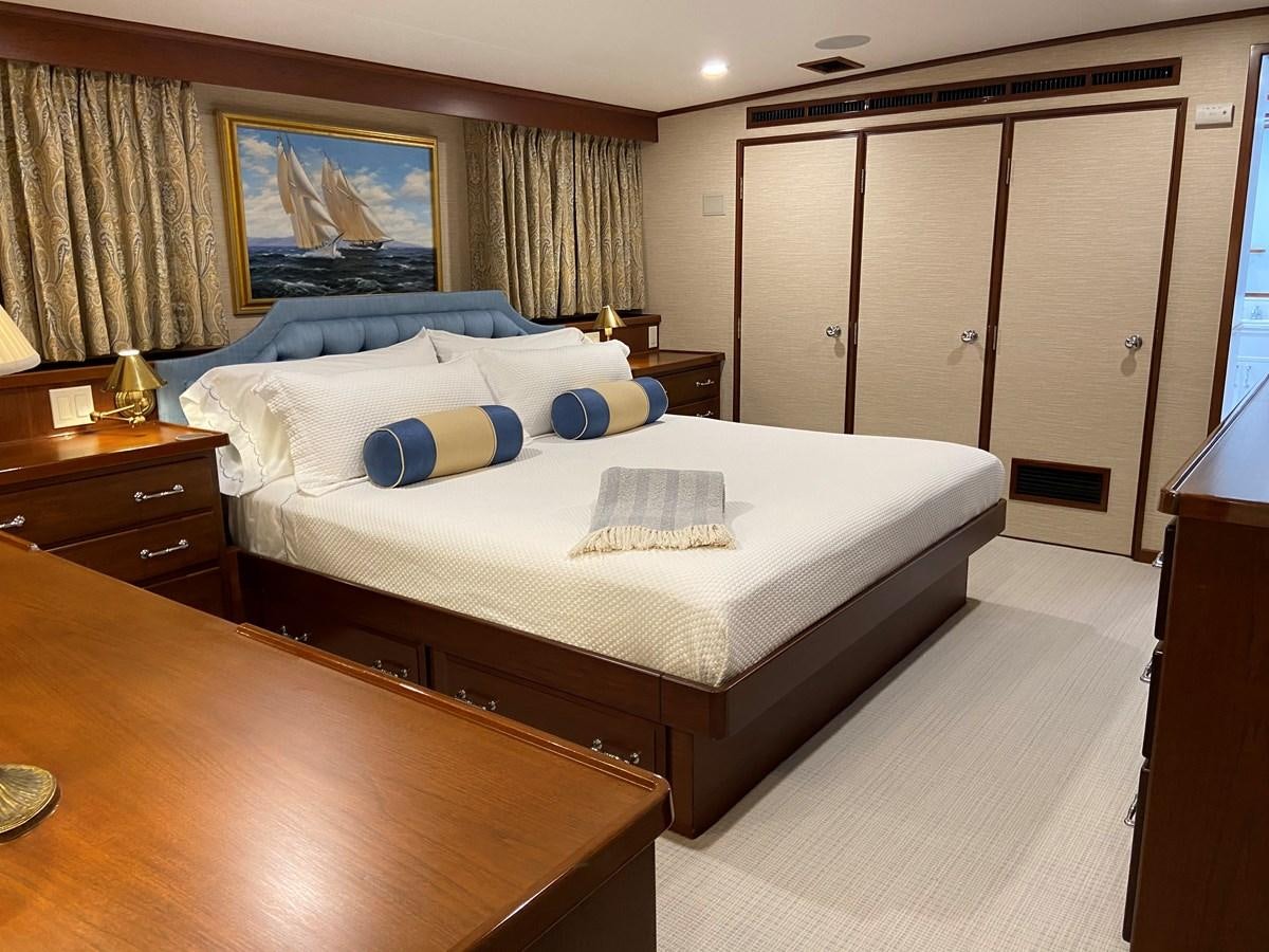 a bed in a hotel room aboard BUCKPASSER Yacht for Sale