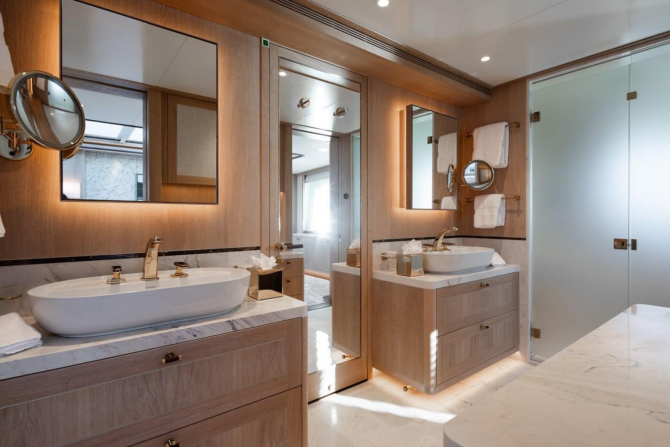 a bathroom with a sink and a mirror aboard SEAFLOWER Yacht for Sale