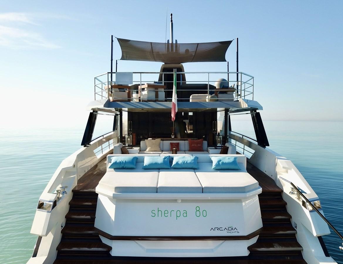a boat on a dock aboard SHERPA 80 Yacht for Sale