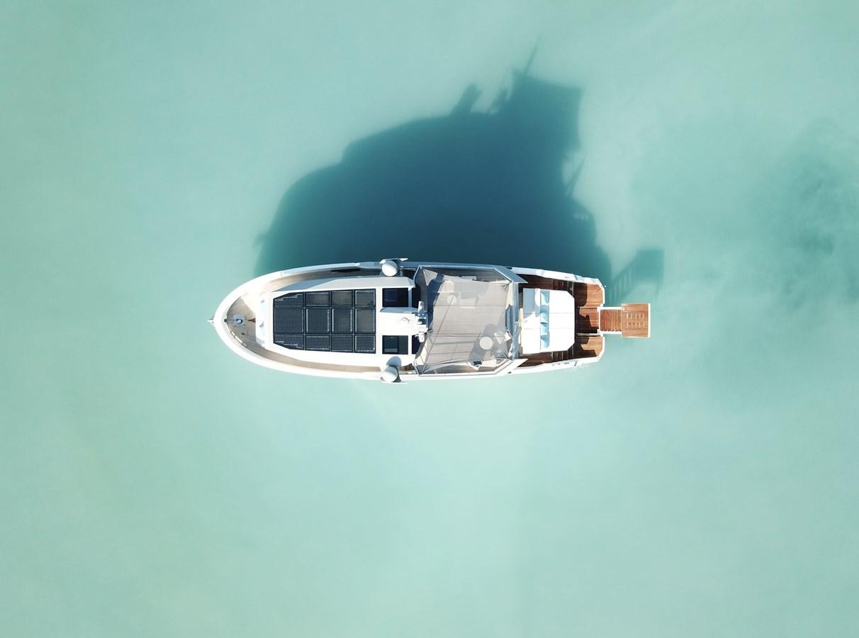 a helicopter flying in the sky aboard SHERPA 80 Yacht for Sale