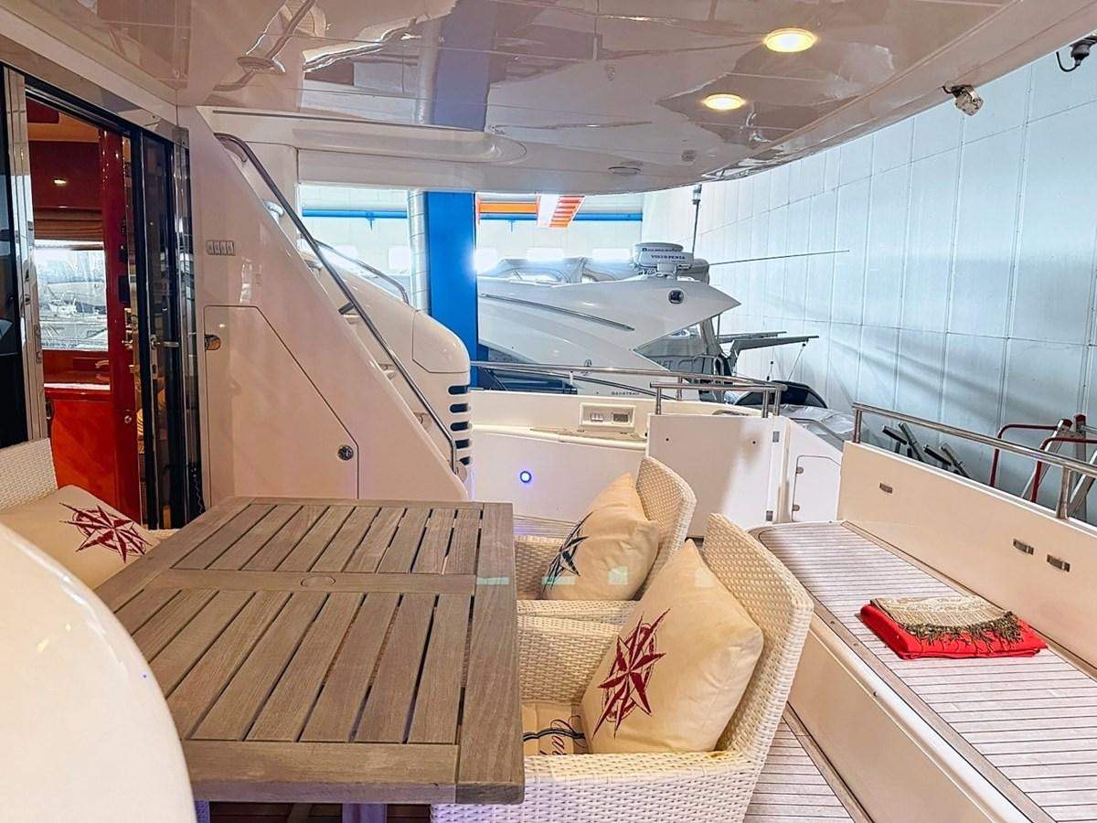 a room with a couch and a bed aboard WET ASSET Yacht for Sale