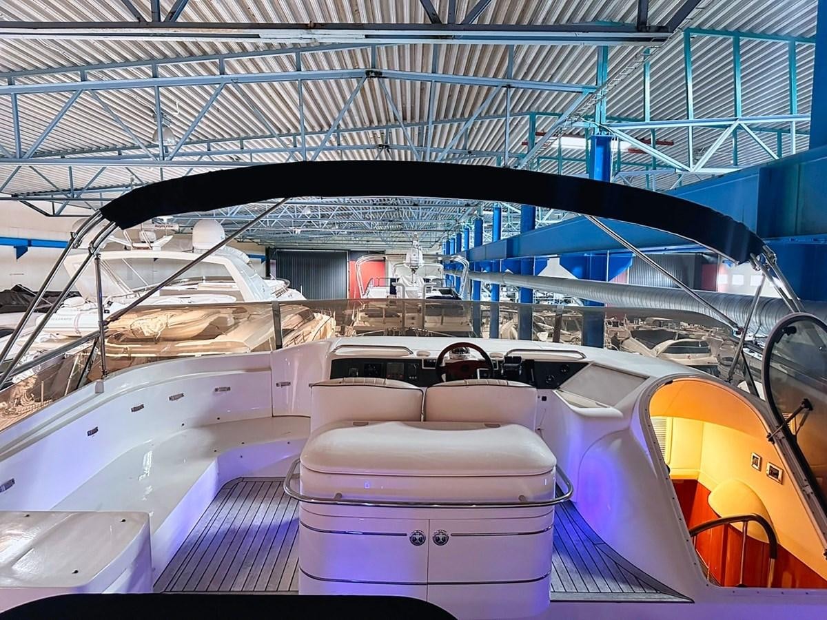 a large white and orange machine aboard WET ASSET Yacht for Sale