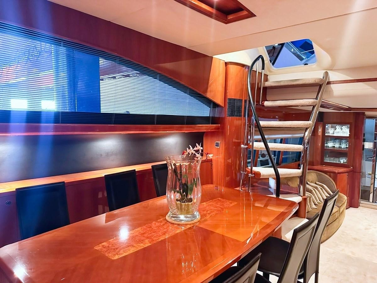 a glass vase on a table aboard WET ASSET Yacht for Sale