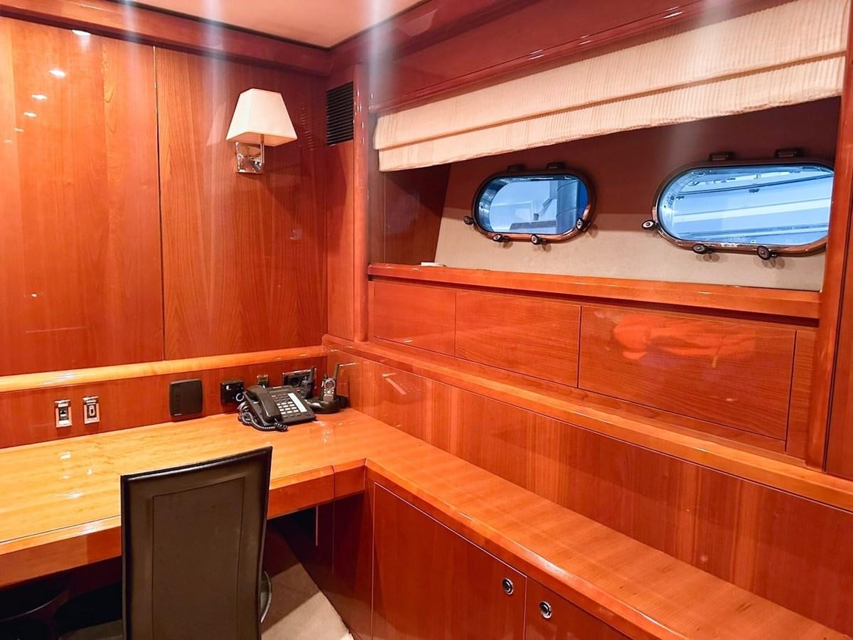 a wooden cabinet with a camera on it aboard WET ASSET Yacht for Sale