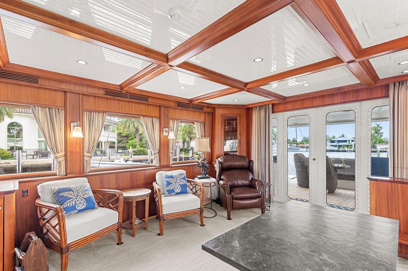 a living room with a large open ceiling aboard SEAS TO SEE Yacht for Sale