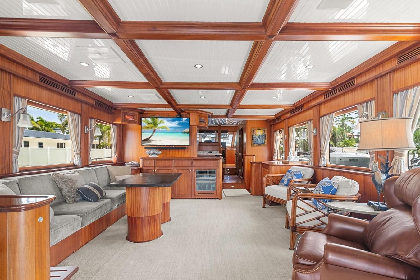 a living room with a wood ceiling aboard SEAS TO SEE Yacht for Sale