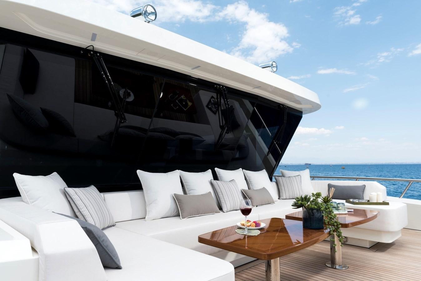 a large white yacht with white pillows aboard SANDRO Yacht for Sale