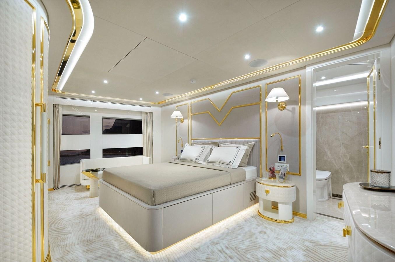a large bedroom with a bed aboard SANDRO Yacht for Sale