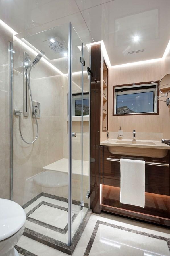 a bathroom with a shower unit and a sink aboard SANDRO Yacht for Sale