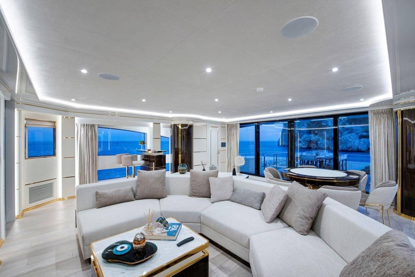 a living room with a large window aboard SANDRO Yacht for Sale