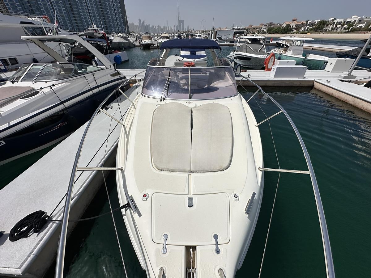 a boat in a harbor aboard 2009 ATLANTIS 315 Yacht for Sale
