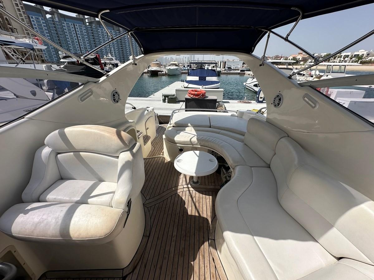 a deck with a view of the ocean and boats aboard 2009 ATLANTIS 315 Yacht for Sale