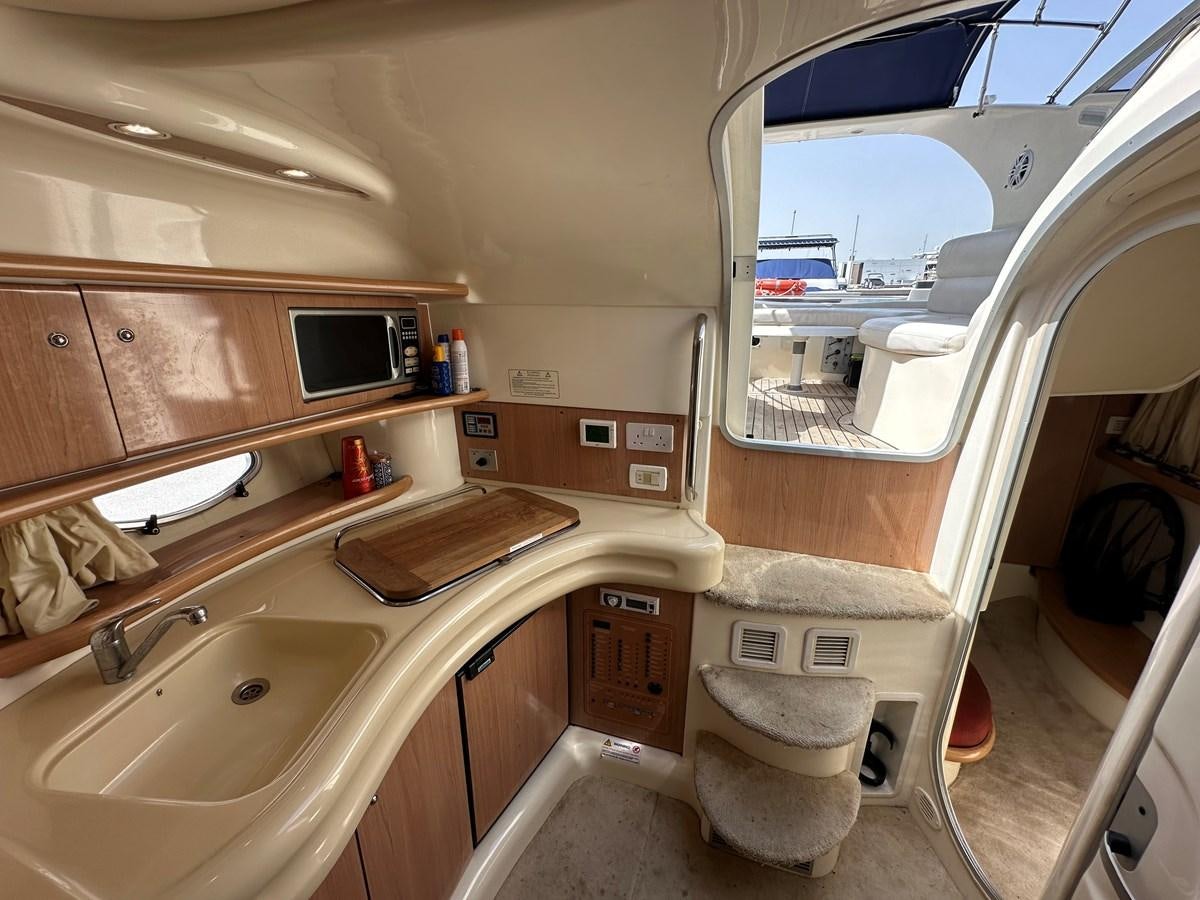 a bathroom with a toilet and sink aboard 2009 ATLANTIS 315 Yacht for Sale
