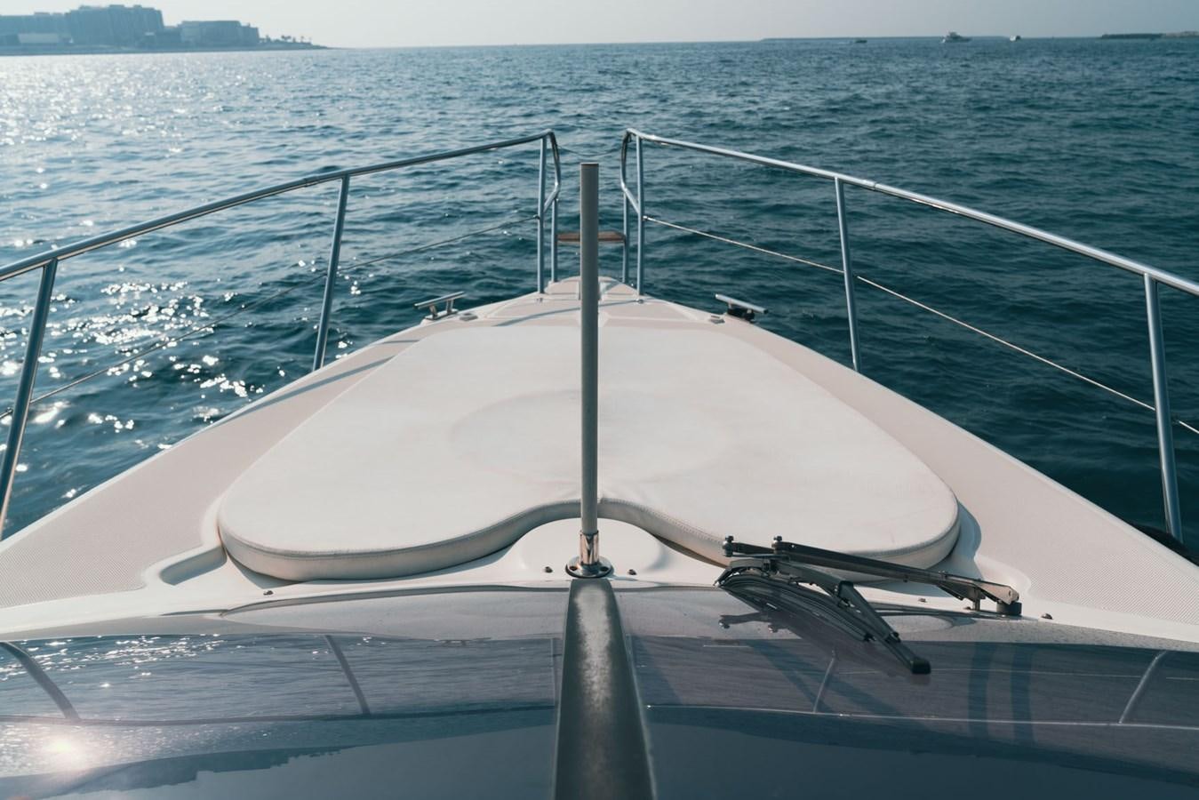 a white boat on the water aboard 2009 ATLANTIS 315 Yacht for Sale