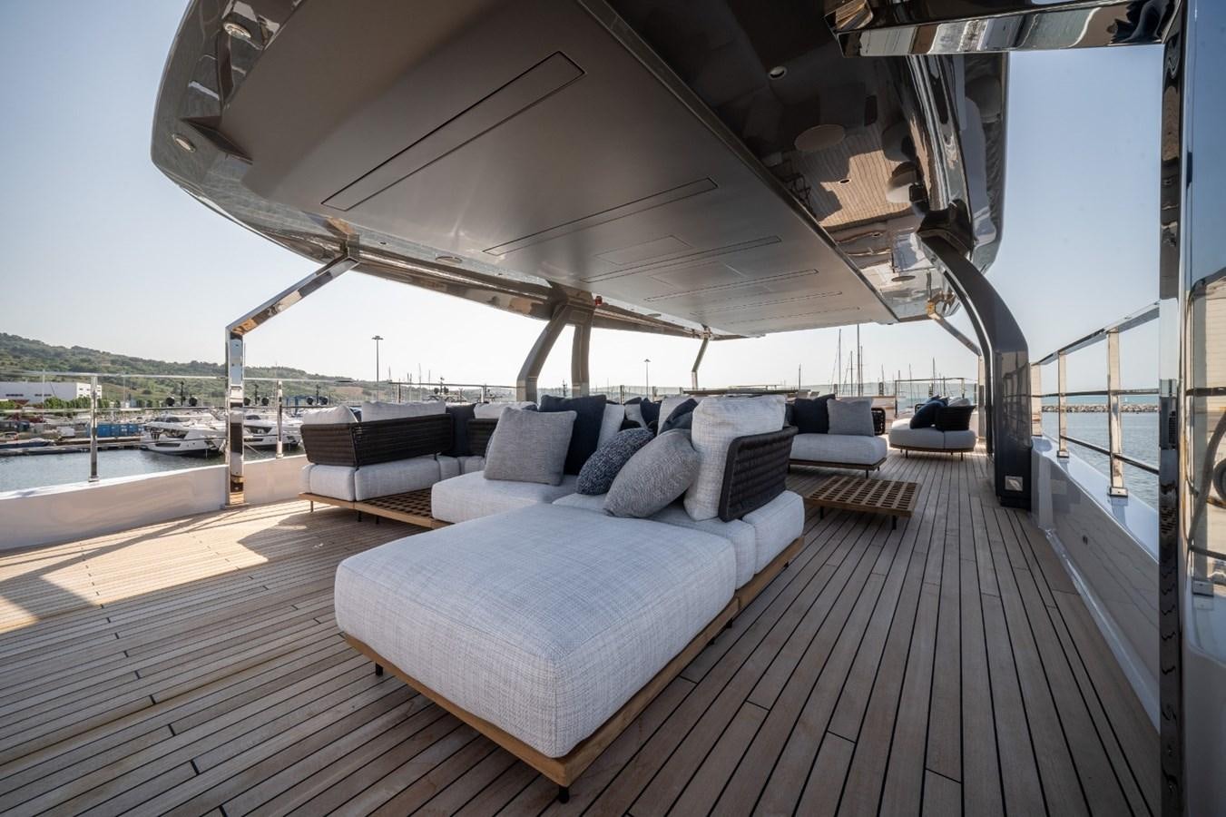 a bed on a deck aboard CUSTOM LINE NAVETTA 42/11 Yacht for Sale