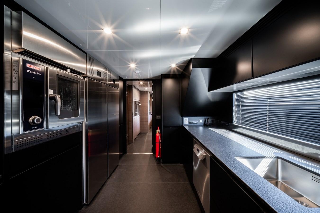 a long hallway with a large sink aboard CUSTOM LINE NAVETTA 42/11 Yacht for Sale