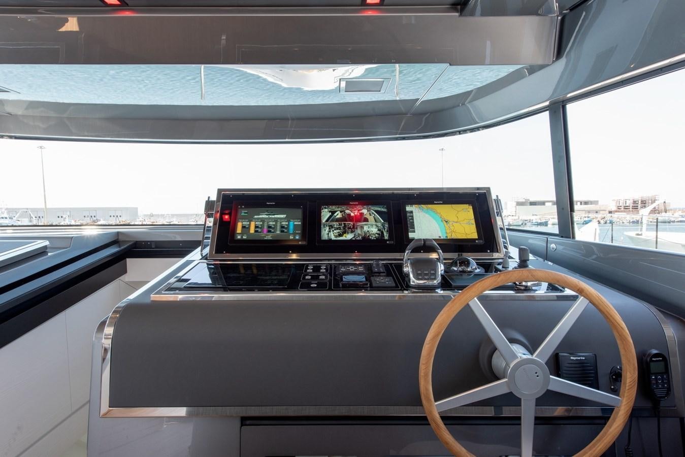 the inside of a car aboard AGNES Yacht for Sale