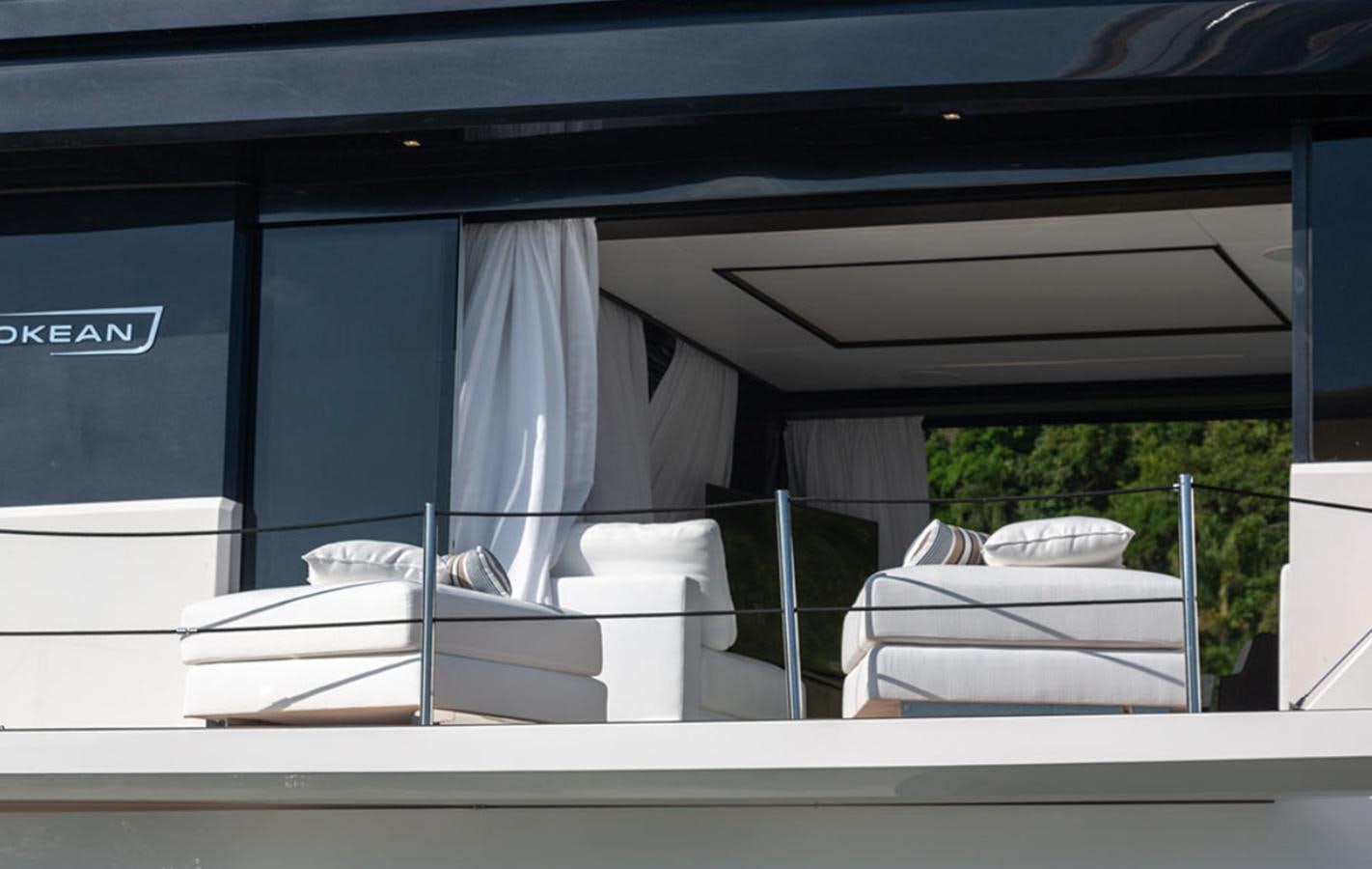 a group of white curtains on a window aboard OKEAN 80/01 Yacht for Sale