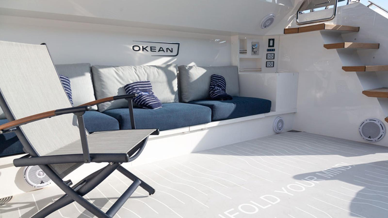 a room with a bed and a desk aboard OKEAN 80/01 Yacht for Sale