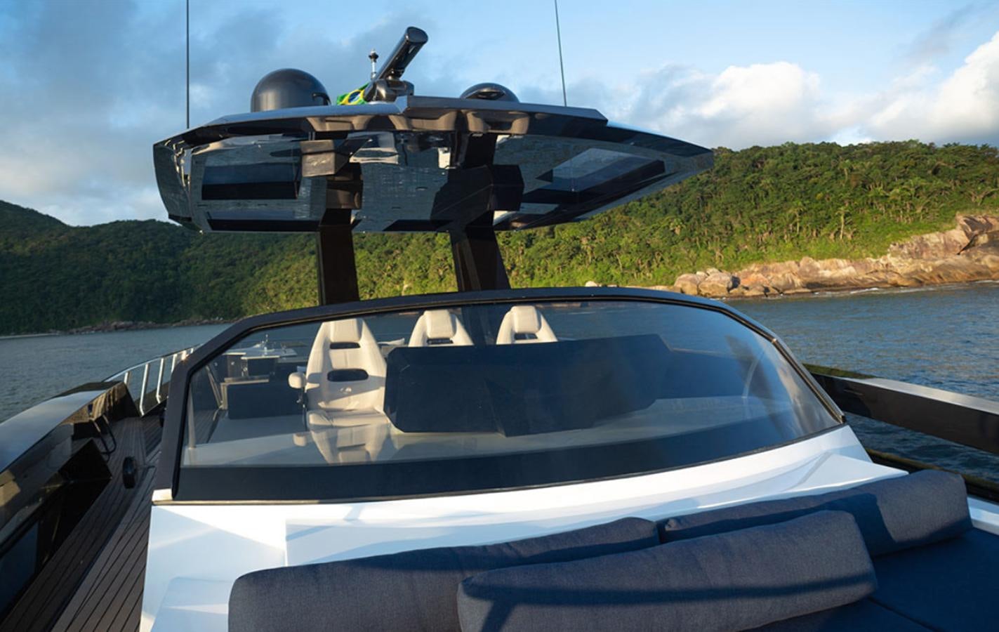 a car driving on a river aboard OKEAN 80/01 Yacht for Sale