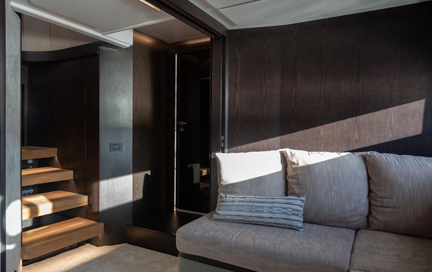a couch in a room aboard OKEAN 80/01 Yacht for Sale