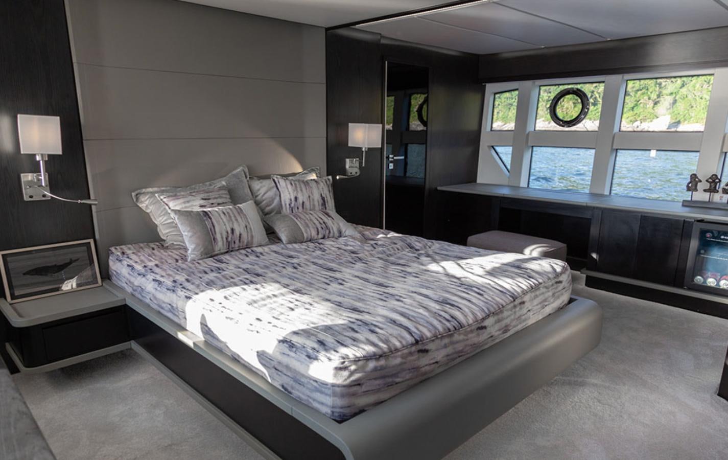 a large bed in a room aboard OKEAN 80/01 Yacht for Sale