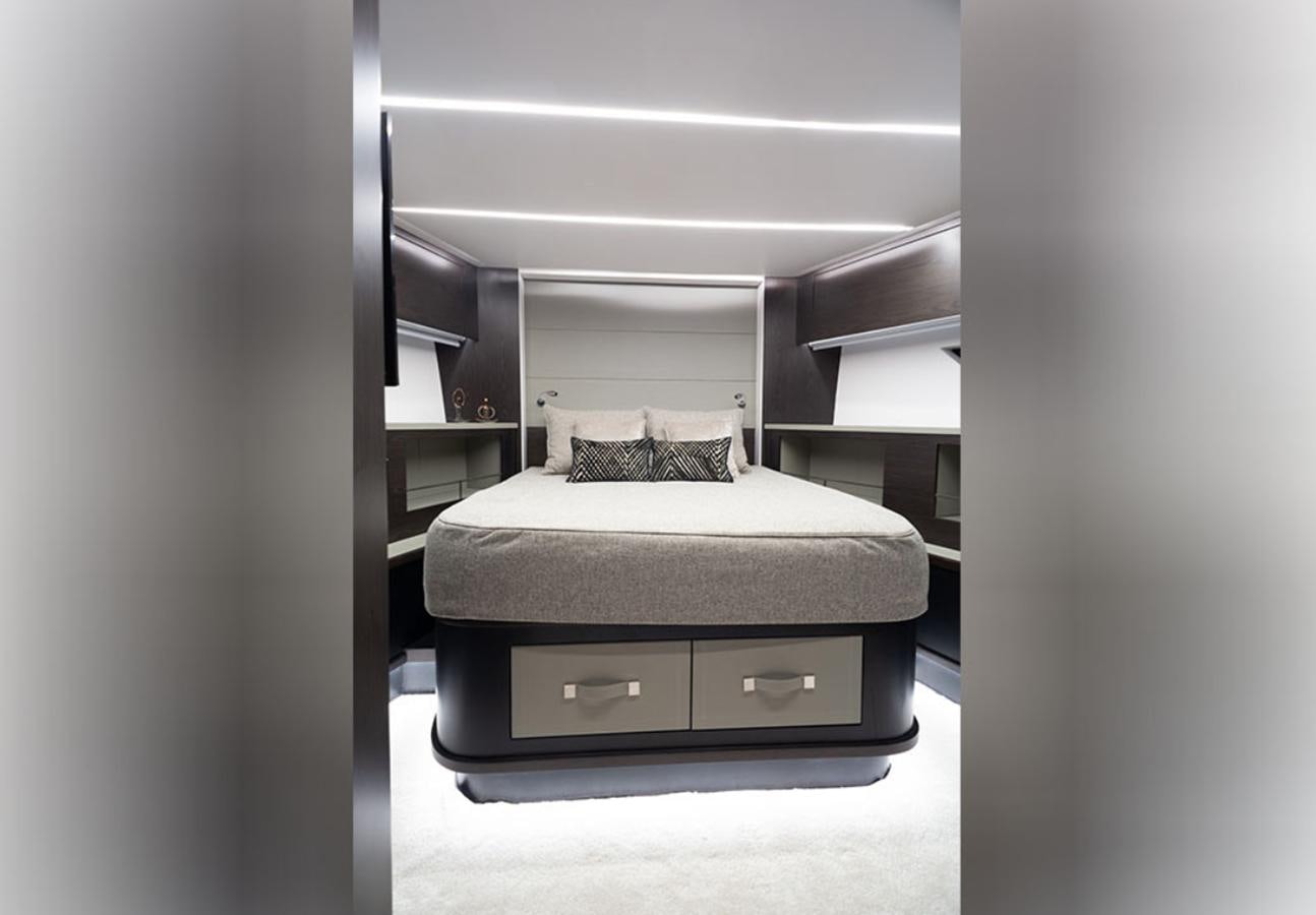 a bed in a room aboard OKEAN 80/01 Yacht for Sale